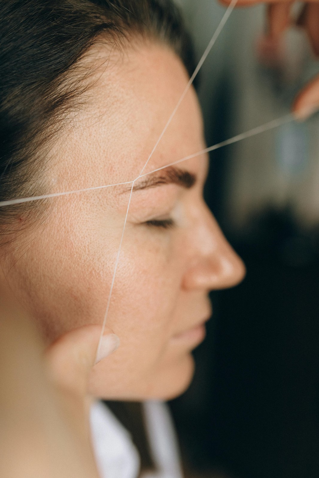 Close-up of threading technique